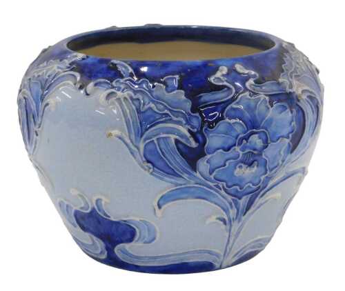 A Moorcroft pottery Florian ware Macintyre bowl, of compressed circular form, tube lined with...