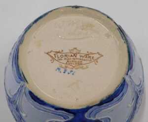A Moorcroft pottery Florian ware Macintyre bowl, of compressed circular form, tube lined with... - 2