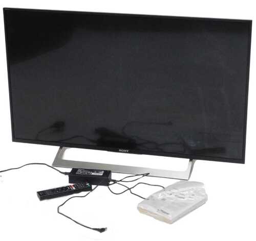 A Sony Bravia 42" television, model number KD43KF8096, with accessories.