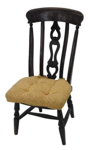 A 19thC ash and elm child's grandfather chair, with a pierced central splat, above shaped seat...