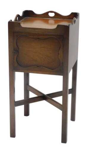 A George III style mahogany night chest, the three part galleried back, with pierced carrying...