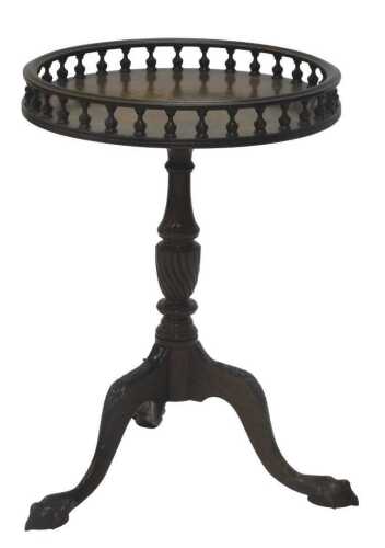 A 20thC Chippendale design walnut occasional table, the circular galleried top raised on a part...