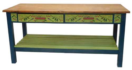An early 20thC pine slatted side table, with two frieze drawers, on heavy block legs, joined by...