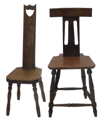 An early 20thC beech stained spinning chair, with inverted splat with pierced shield emblem,...