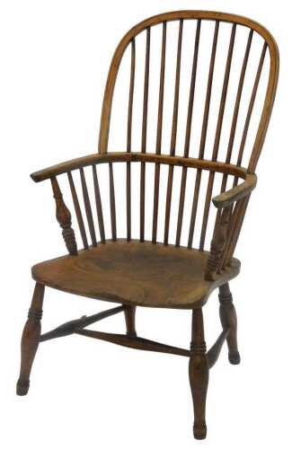 A 19thC ash and elm high back Windsor chair, with plain stick back above shaped seat, on double...