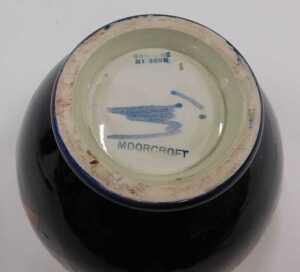 A Moorcroft pottery flambe Clematis pattern vase, of tapering circular form on circular foot,... - 2