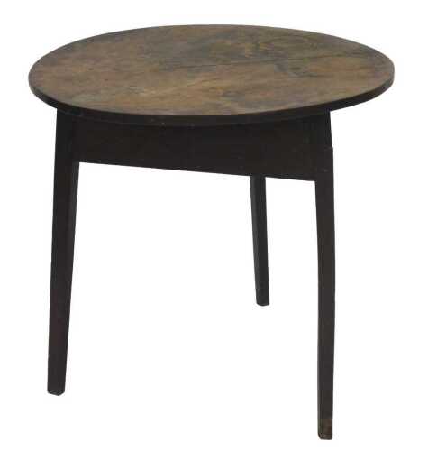 A 19thC mahogany top cricket table, the circular top raised on three chamfered legs, 72cm high,...