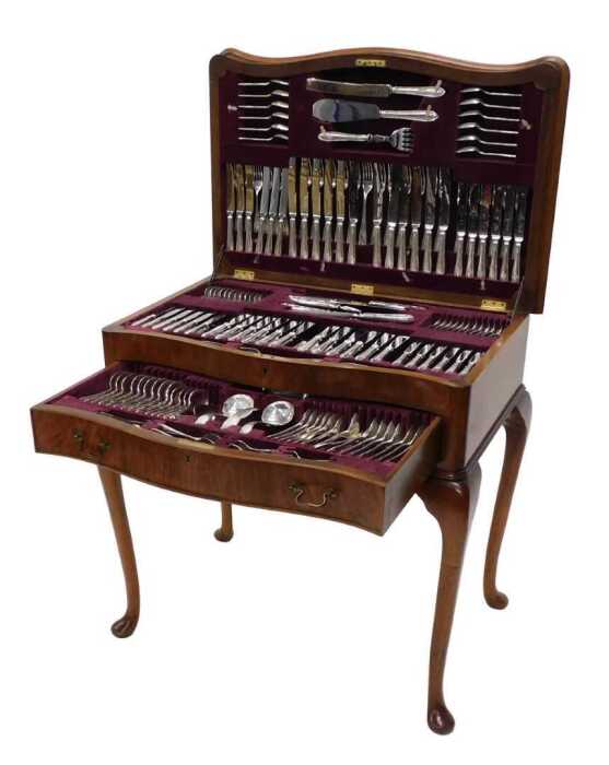 A comprehensive Elizabeth II silver canteen of cutlery, part settings for twelve, comprising...