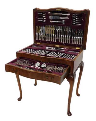 A comprehensive Elizabeth II silver canteen of cutlery, part settings for twelve, comprising...
