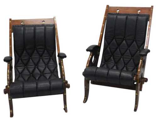 A pair of Anglo-Indian campaign chairs, each of scroll form, with part gilt metal floral and...