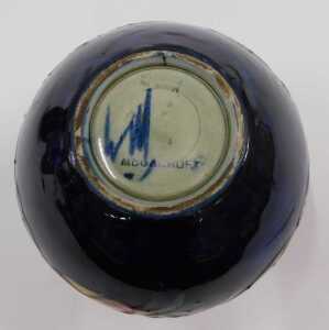 A Moorcroft pottery Anemone pattern squat vase, with compressed stem, bellied body, on blue... - 2