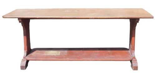 A 19thC mahogany serving table, the oblong top raised above shaped stiles, on a block base...