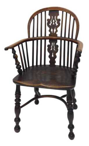 A 19thC yew and elm lowback Windsor chair, with pierced Retford style splat, shaped arm supports...