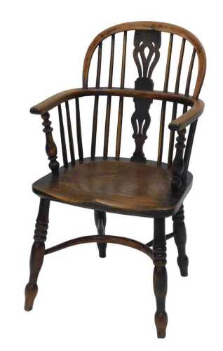 A 19thC yew and elm lowback Windsor chair, with pierced Retford style splat, shaped arm supports...
