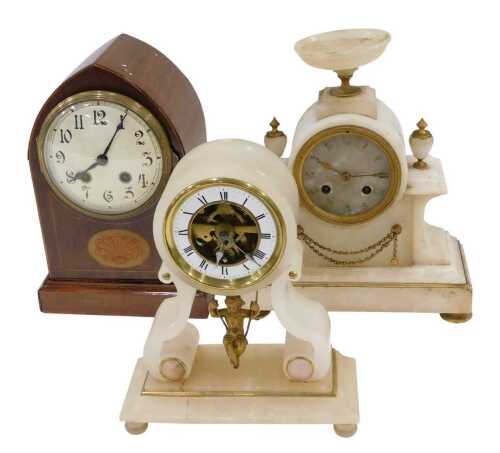 Various mantel clocks, an Edwardian mahogany mitre topped mantel clock, with oval floral inlay,...