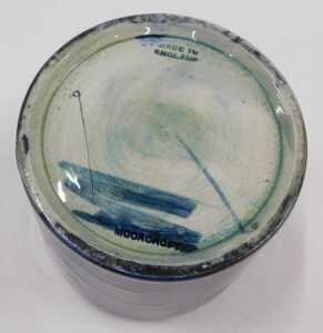 A Moorcroft pottery Freesia pattern jar and cover, of circular form, on blue ground, 11cm high. - 3