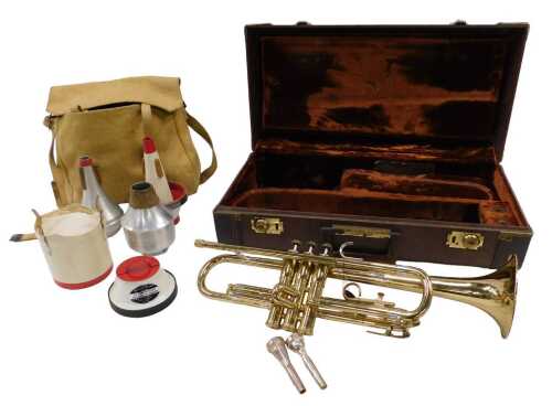 A 20thC Olds Ambassador Fullerton brass trumpet, with three buttons, 49cm wide, in fitted case,...