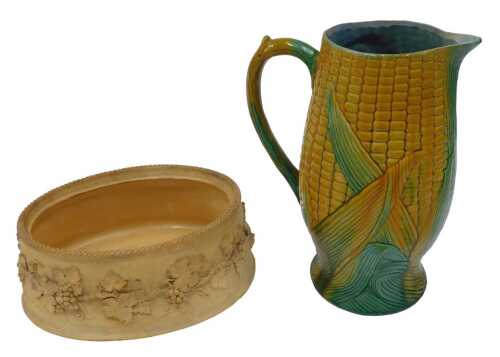 A late 19thC Continental Majolica pottery sweetcorn jug, with moulded acanthus style handle,...