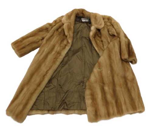 A vintage off tan three quarter length fur coat, partially lined with Continental Firs 152...