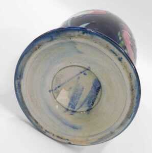 A Moorcroft pottery Big Poppy pattern vase, of circular form on circular foot, on blue ground,... - 2