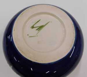 A Moorcroft pottery Anemone pattern squat vase, of bellied circular form on circular foot, on... - 2