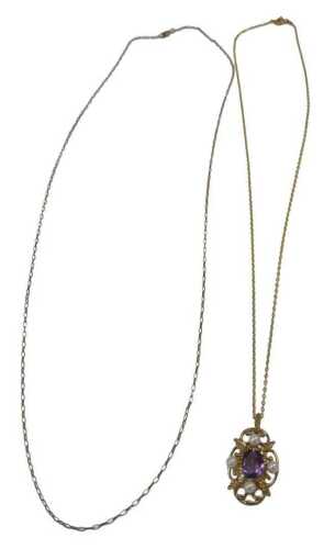 Two 9ct gold chains, comprising a fine link chain, 56cm long, and a further fine link chain with...