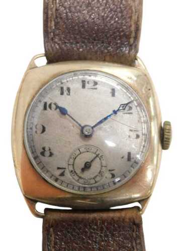 A 9ct gold cased gent's wristwatch, with a silvered numeric dial and blue hands, with seconds...