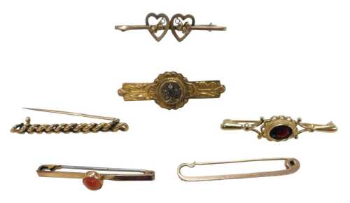 Six 9ct gold Victorian and later bar brooches, comprising a chain link brooch, 4cm wide, a plain...