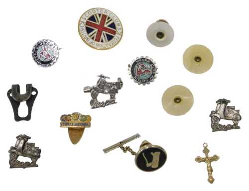 A group of miscellaneous badges and effects, comprising a crucifix pendant, yellow metal...