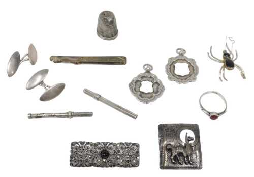 A group of silver and other jewellery and trinkets, comprising two silver shield medallions, a...