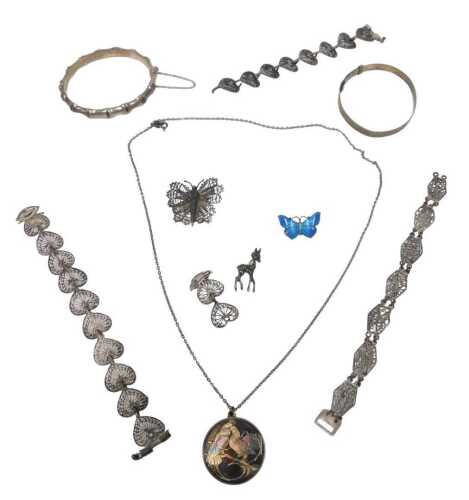 A group of silver and other jewellery, comprising two silver bangles, a silver and marcasite...