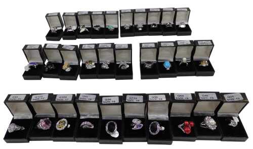 Thirty dress rings, of varying design, mainly stone set, boxed.