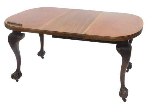 A very late 19thC mahogany D-end extending dining table, raised on heavily carved acanthus leaf...