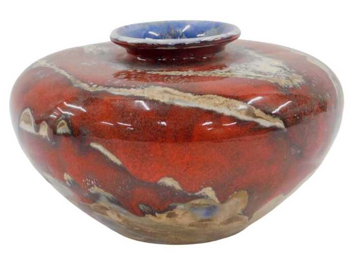 An Anita Harris Moorcroft Black Ryden pattern vase, in red and white, with compressed stem and...