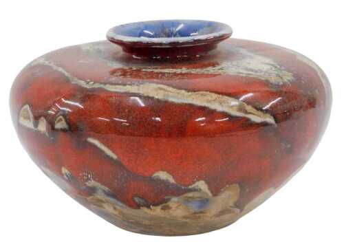 An Anita Harris Moorcroft Black Ryden pattern vase, in red and white, with compressed stem and...