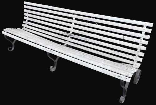 An early 20thC iron framed wooden slatted railway style bench, with scroll front legs and wheels...