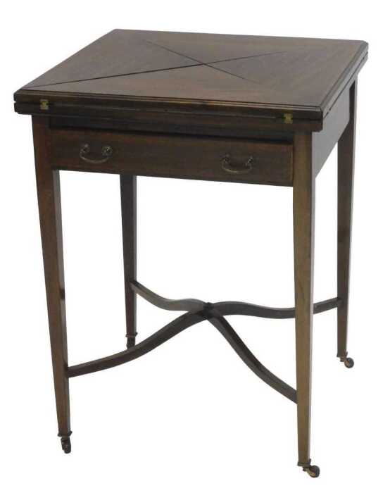 An Edwardian mahogany and boxwood strung envelope table, the square top with a wide crossbanding...