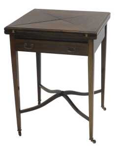 An Edwardian mahogany and boxwood strung envelope table, the square top with a wide crossbanding...