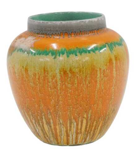A Shelley dripware vase, predominantly in green, orange and yellow, 12cm high.