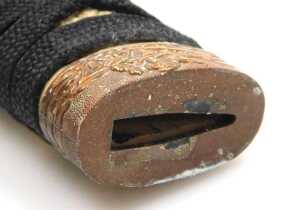 A 20thC Japanese Tanto, the tsuka wrapped in ray skin, and bound with cord, the copper habaki... - 9