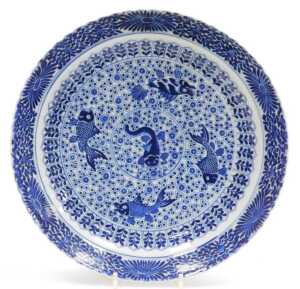 A Chinese Qing Dynasty blue and white five porcelain fishes dish, decorated with fish within...