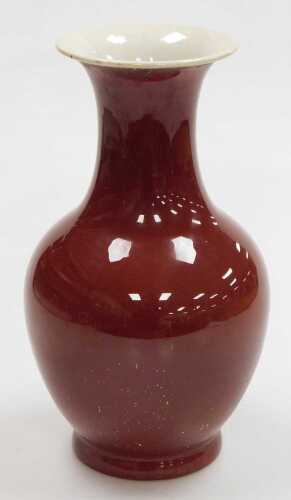 A late 19thC Chinese sang-de-boeuf porcelain vase, of baluster form, 32cm high.