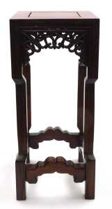 A small Chinese hardwood urn stand, of square section, with scrolling fretwork raised on square... - 2