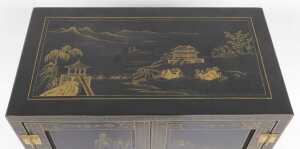 A Chinese lacquered cabinet, gilt decorated with river landscapes, having two doors opening to... - 5