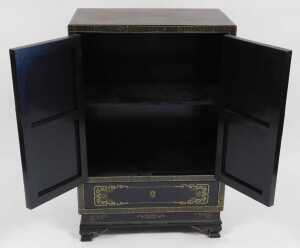 A Chinese lacquered cabinet, gilt decorated with river landscapes, having two doors opening to... - 6