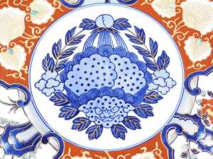 A late 20thC Japanese Imari charger, decorated with reserves of trees and prunus blossom, and... - 2