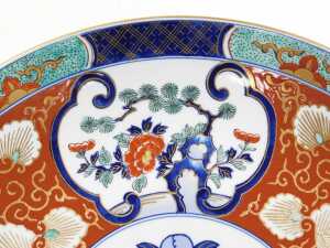 A late 20thC Japanese Imari charger, decorated with reserves of trees and prunus blossom, and... - 3