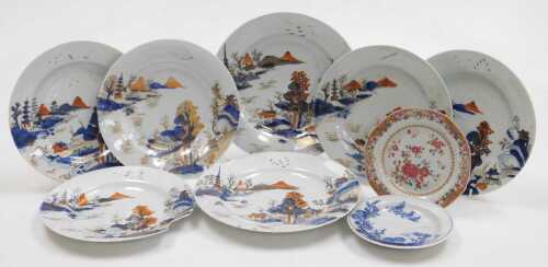A late 18th/early 19thC Chinese Imari part dinner service, decorated with a river and mountain...