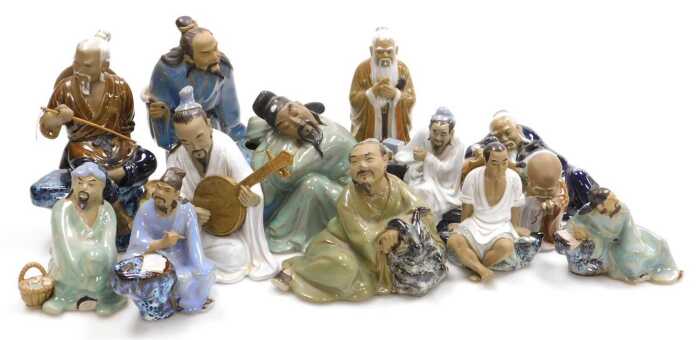 Assorted Chinese Shiwan mudman figures, including a sitar player, fisherman, street sellers, etc....