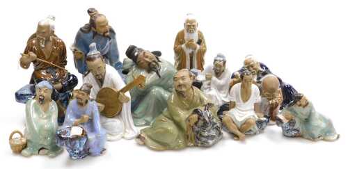 Assorted Chinese Shiwan mudman figures, including a sitar player, fisherman, street sellers, etc....